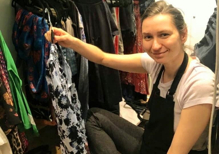 Olena Dibrivna of Harmony Home Organizing decluttering a closet